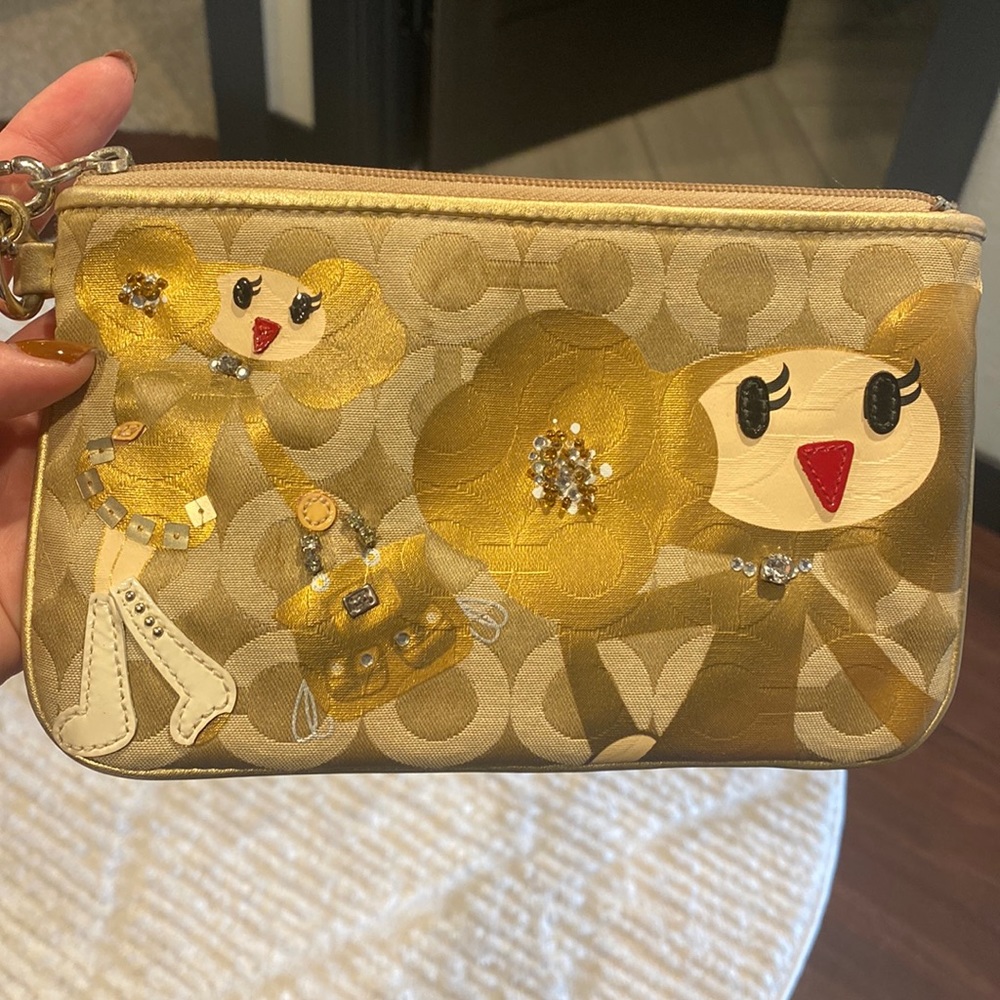 Coach poppy gold wristlet